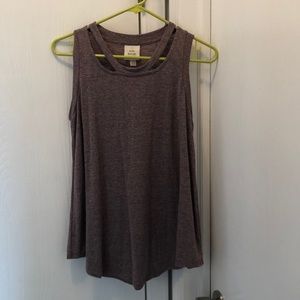 Pink tank with trendy neck cuts